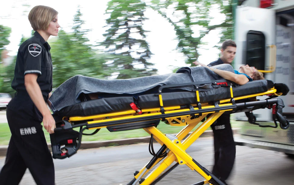 How does an ambulance stretcher work